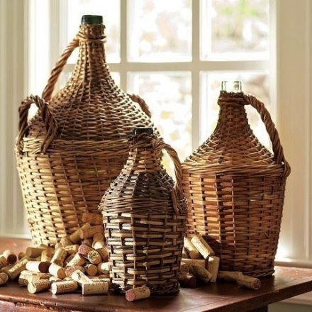 Antique wicker demijohn bottles